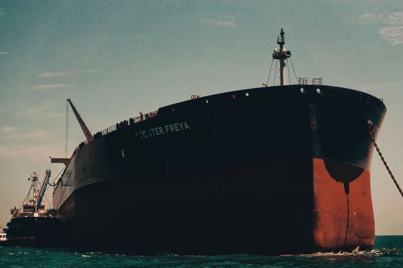 Bulk carrier at anchor, waiting for its port call